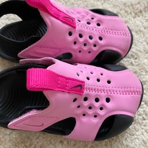 Pink Nike water shoes. Size 5